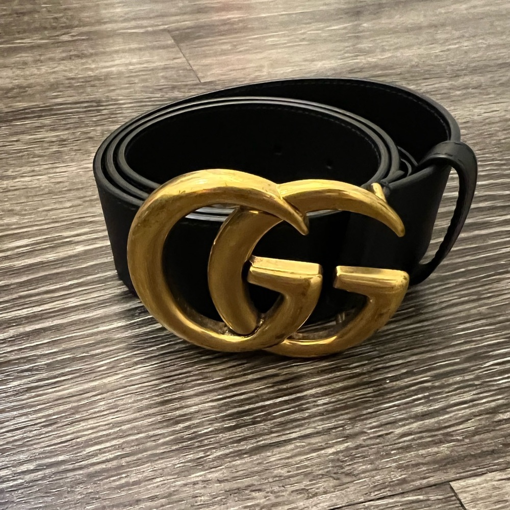 Authentic Gucci belt black and gold size 75